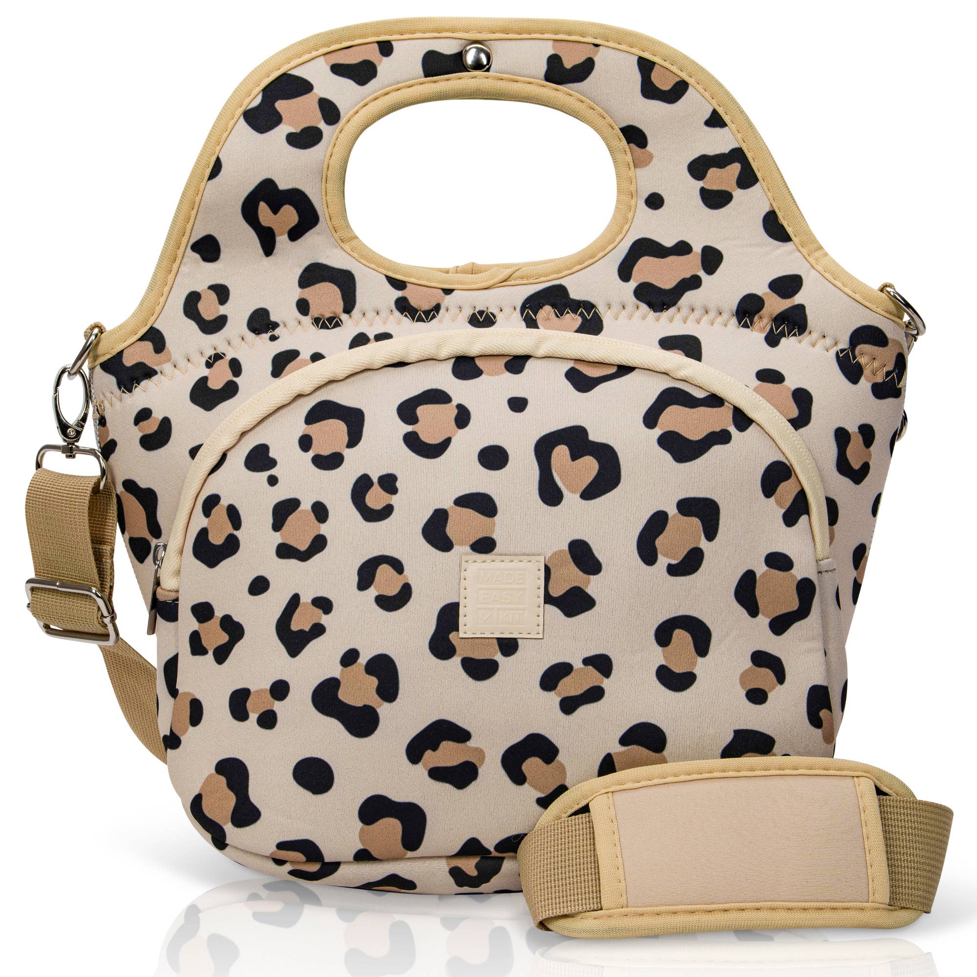 Leopard print handbag with beige strap on a beige background